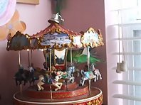 Buddy riding the merry-go-round